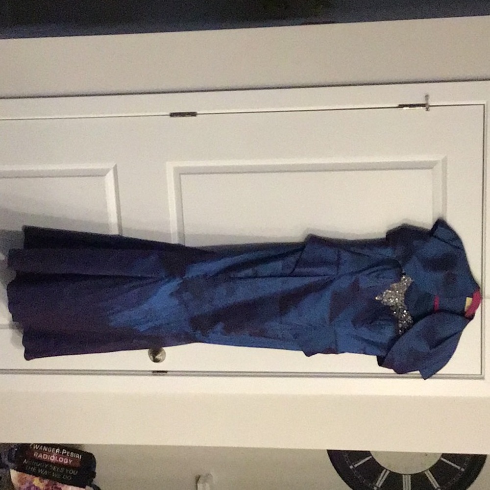 Women’ s strapless iridescent blue peplum gown